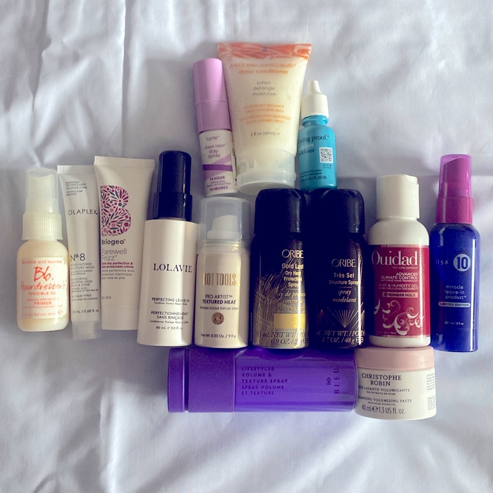 New HAIR CARE . 12 travel size and 2 mini not opened or tried